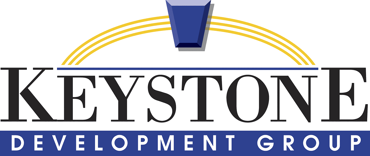 Partial logo showing 'YSTO' and a blue geometric shape above.